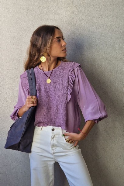 Blusa con fruncido...