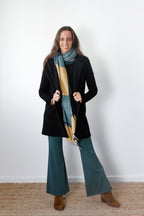 Pantalón de punto campana verde