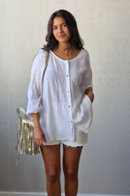 Camisa oversize con manga tres cuartos en color blanca