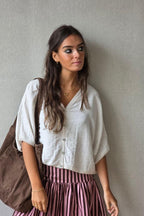 Chaqueta manga corta beige