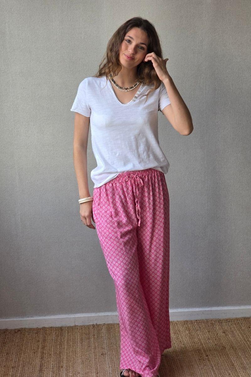 Pantalón estampado largo de flores fucsia