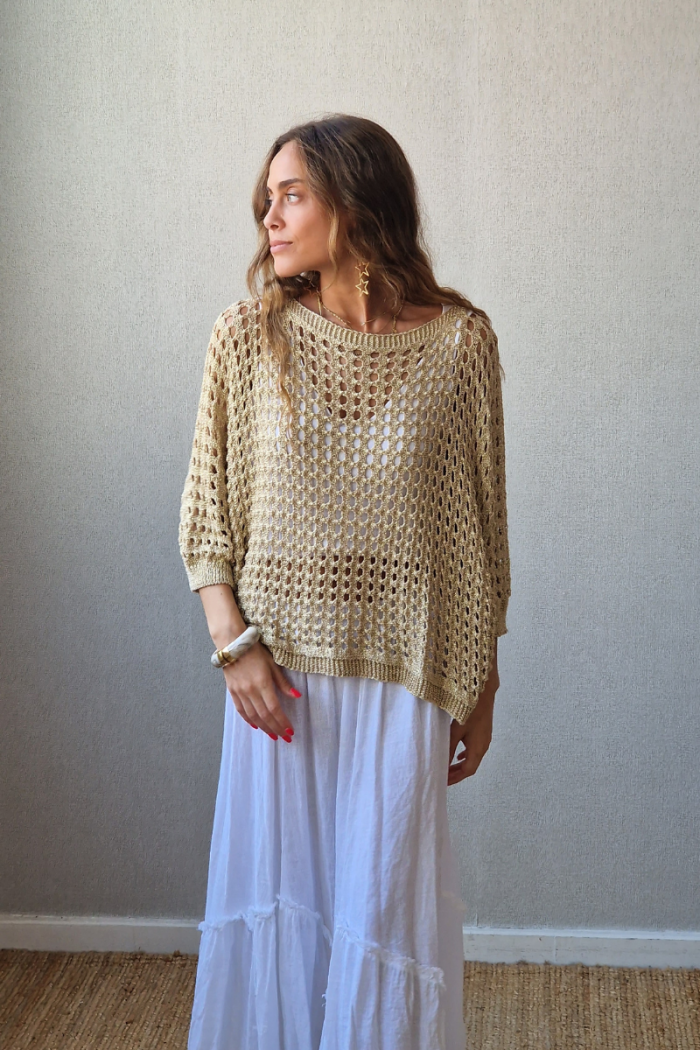 Jersey de punto calado con lazo dorado