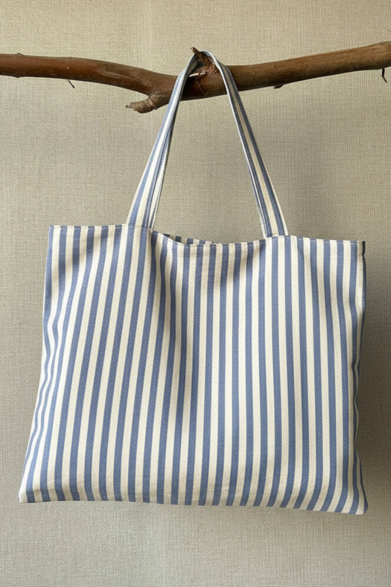 Bolso mediano con cremallera de rayas azul jean