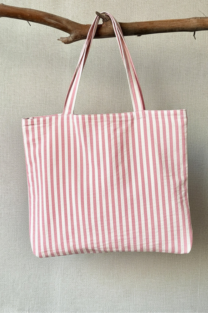 Bolso mediano con cremallera de rayas rosa