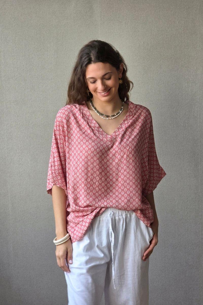 Blusón oversize estampado de flores rosa