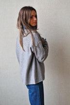 Jersey oversize cuello redondo gris