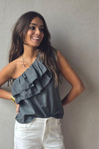 Blusa de volantes gris