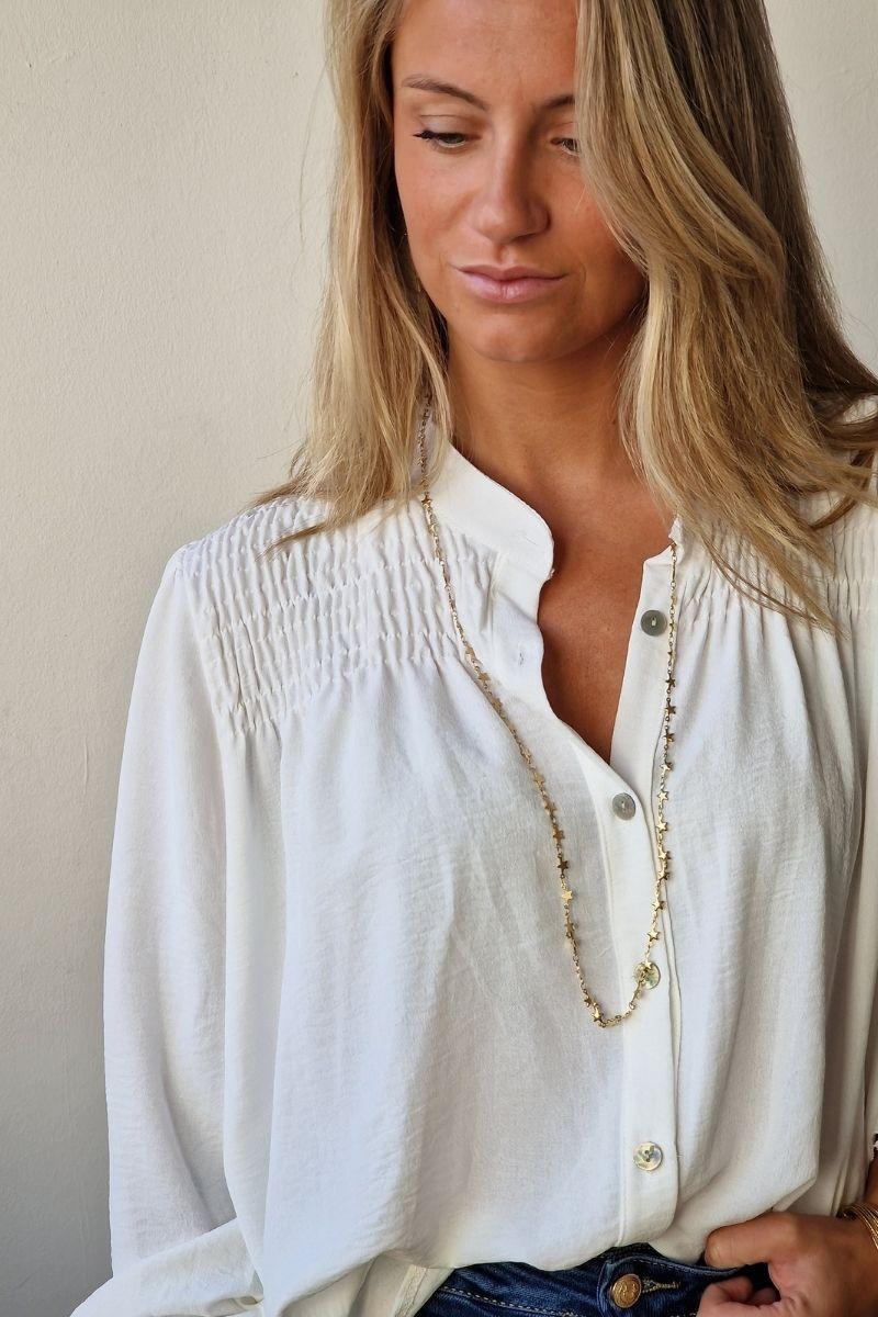 Blusa con botones blanco roto