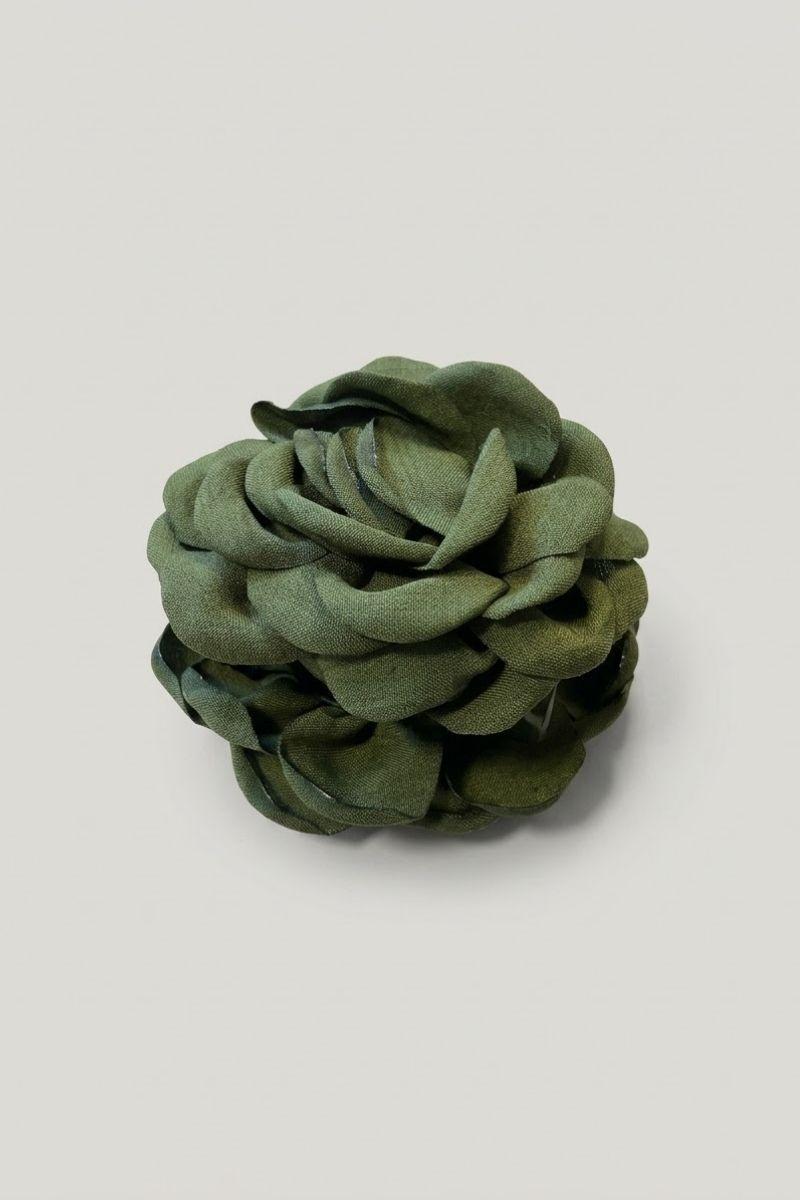 Pinza de flor verde botella