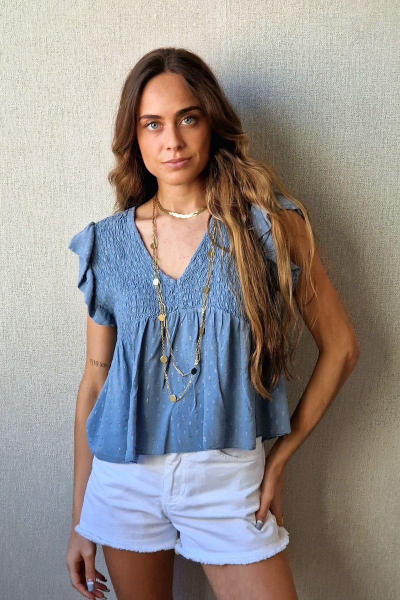 Blusa cuello pico con detalles lurex azul
