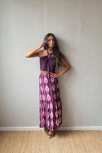 Conjunto de top y falda berenjena