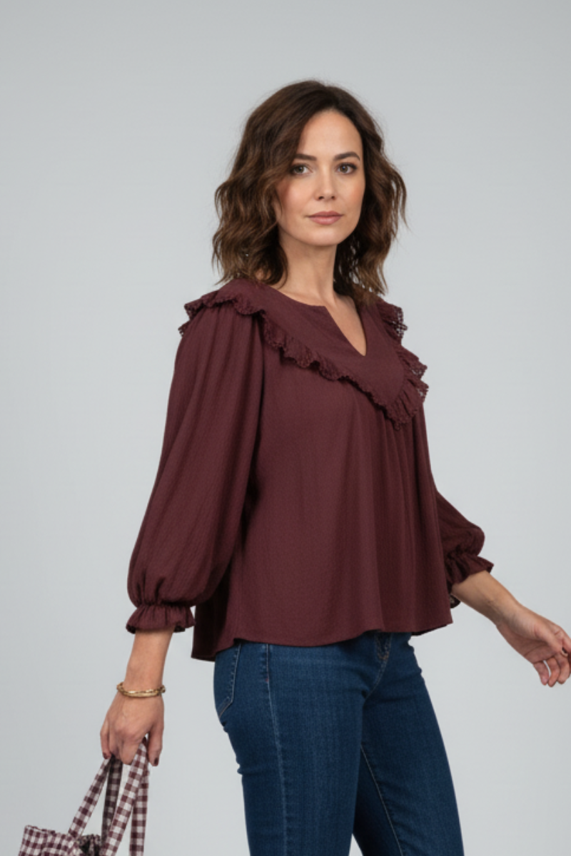 BLUSA ESCOTE PICO TIPO BAMBULA BERENJENA