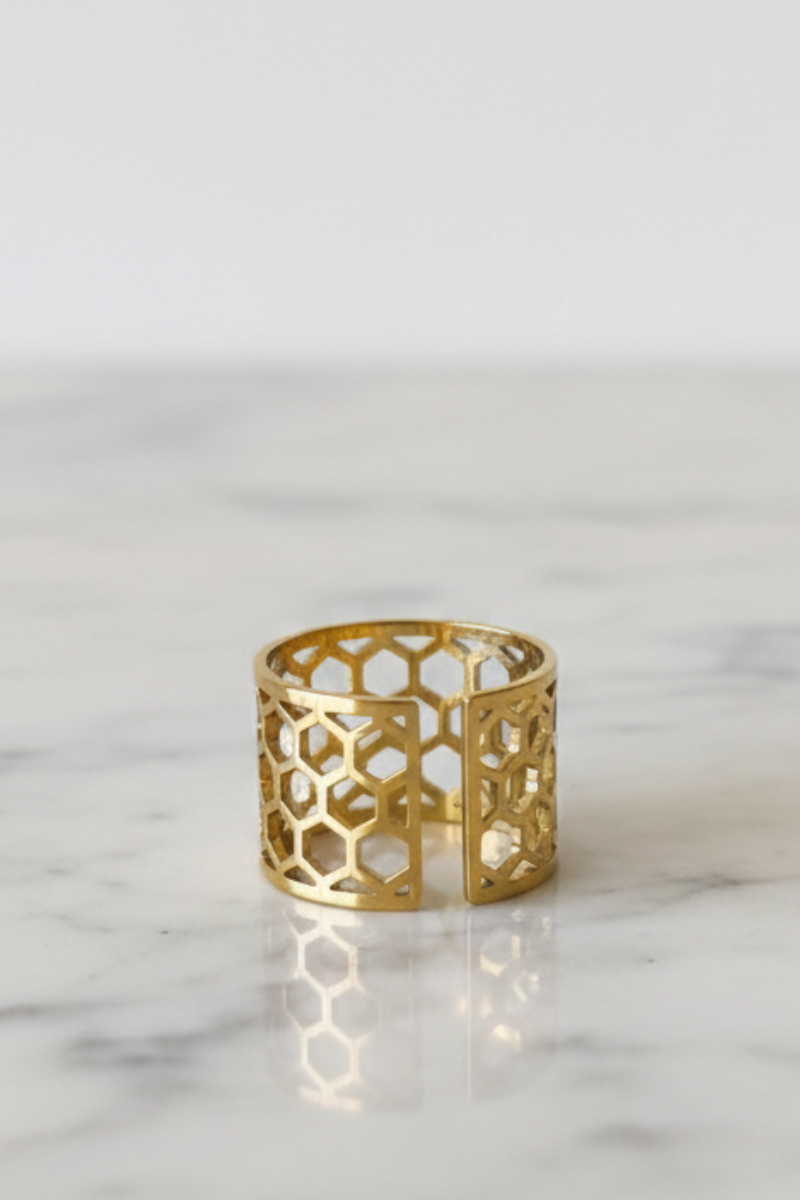 Anillo ajustable calado de acero dorado