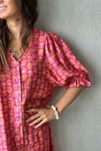 Vestido flores con botones fucsia