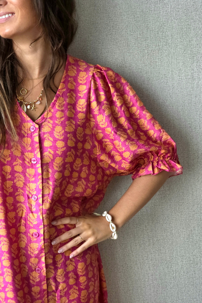 Vestido flores con botones fucsia