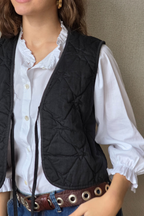 Chaleco acolchado con estrellas negro