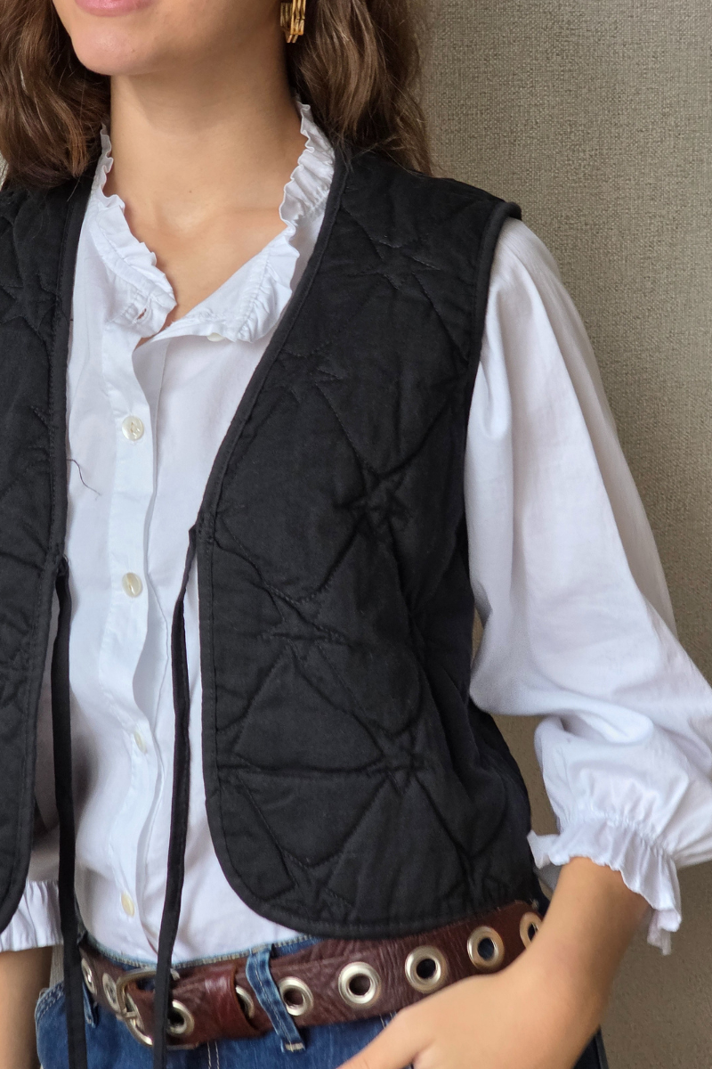 Chaleco acolchado con estrellas negro