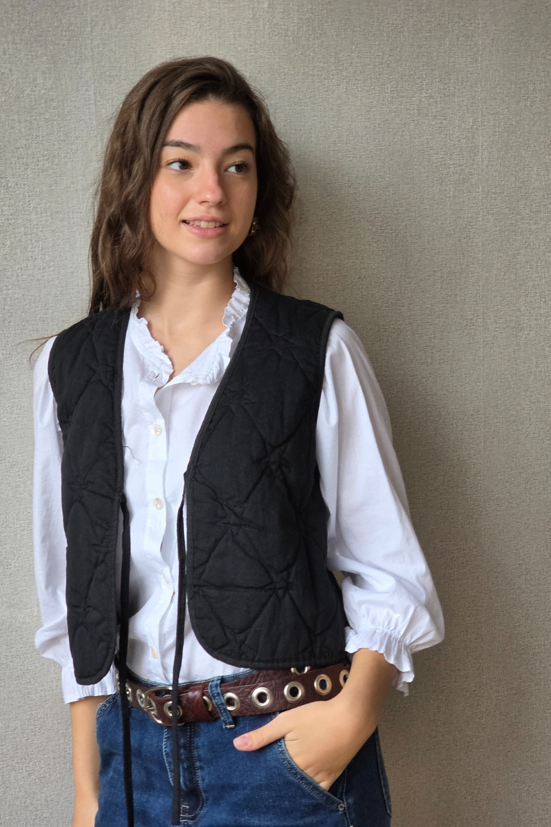 Chaleco acolchado con estrellas negro