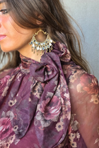 Blusa Bloom estampado de flores y lazo granate