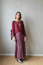 Falda larga con estampada granate