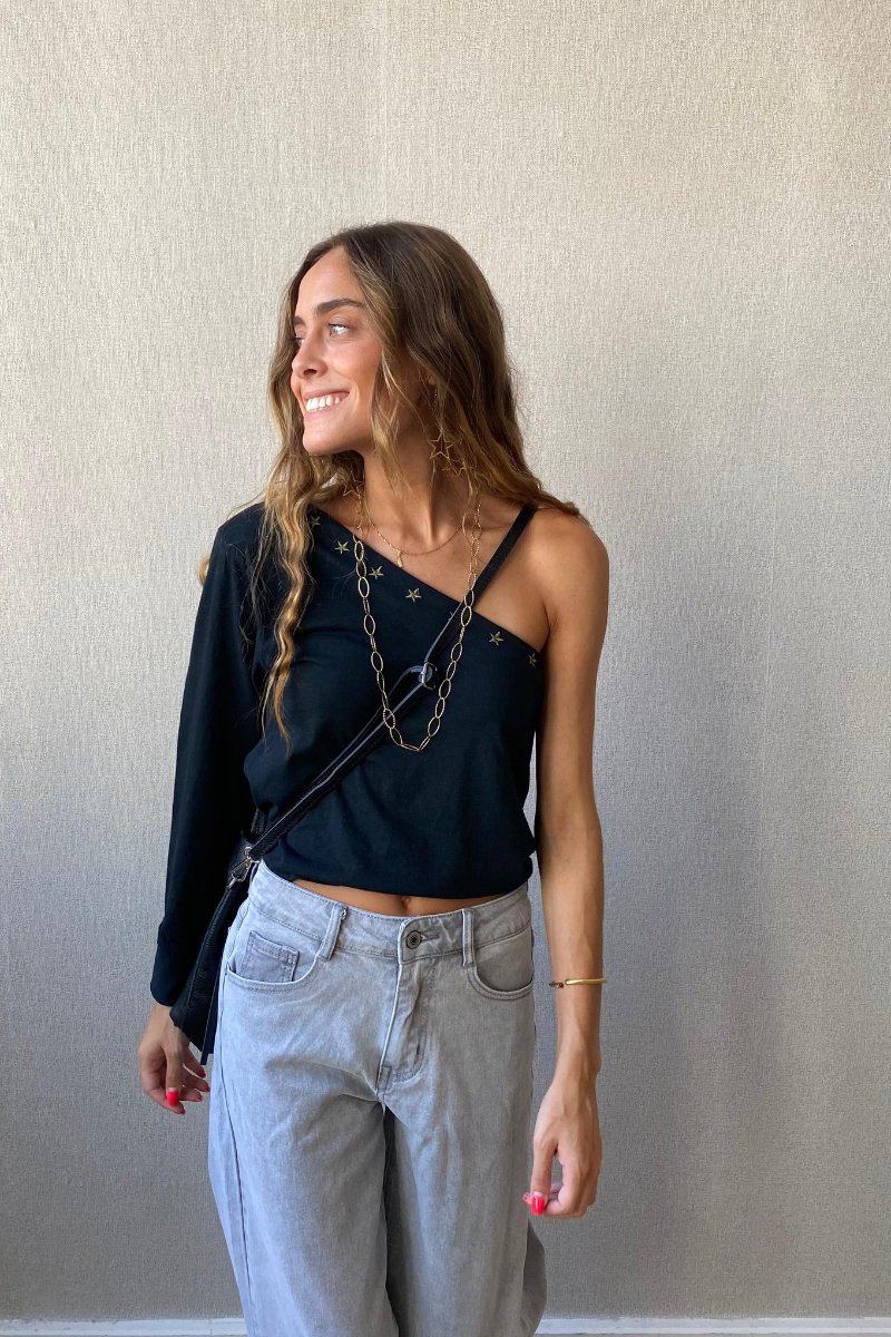 Top asimétrico con estrellas negro