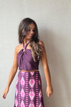 Conjunto de top y falda berenjena