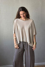 Jersey tipo capa manga calada beige