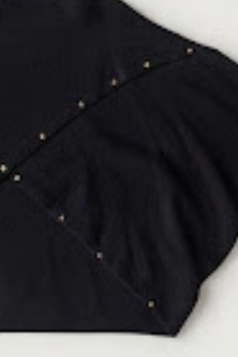 jersey cruzado tenn con tachas