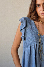 Blusa cuello pico con detalles lurex azul