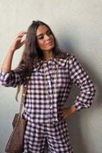 Camisa animal print con brillos berenjena