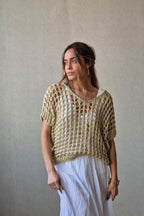 Jersey de punto calado dorado sin mangas
