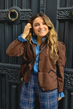 Chaqueta espiguilla chocolates rematada en negro
