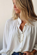 Blusa con botones blanco roto