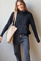 Jersey trenza cuello alto negro