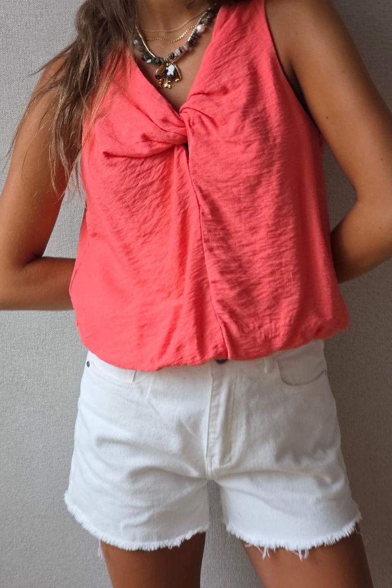 Top nudo coral