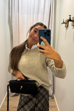 Bolso baguette trenzado negro