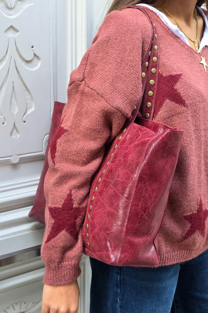 Jersey punto cuello pico con estrellas rosa pepe