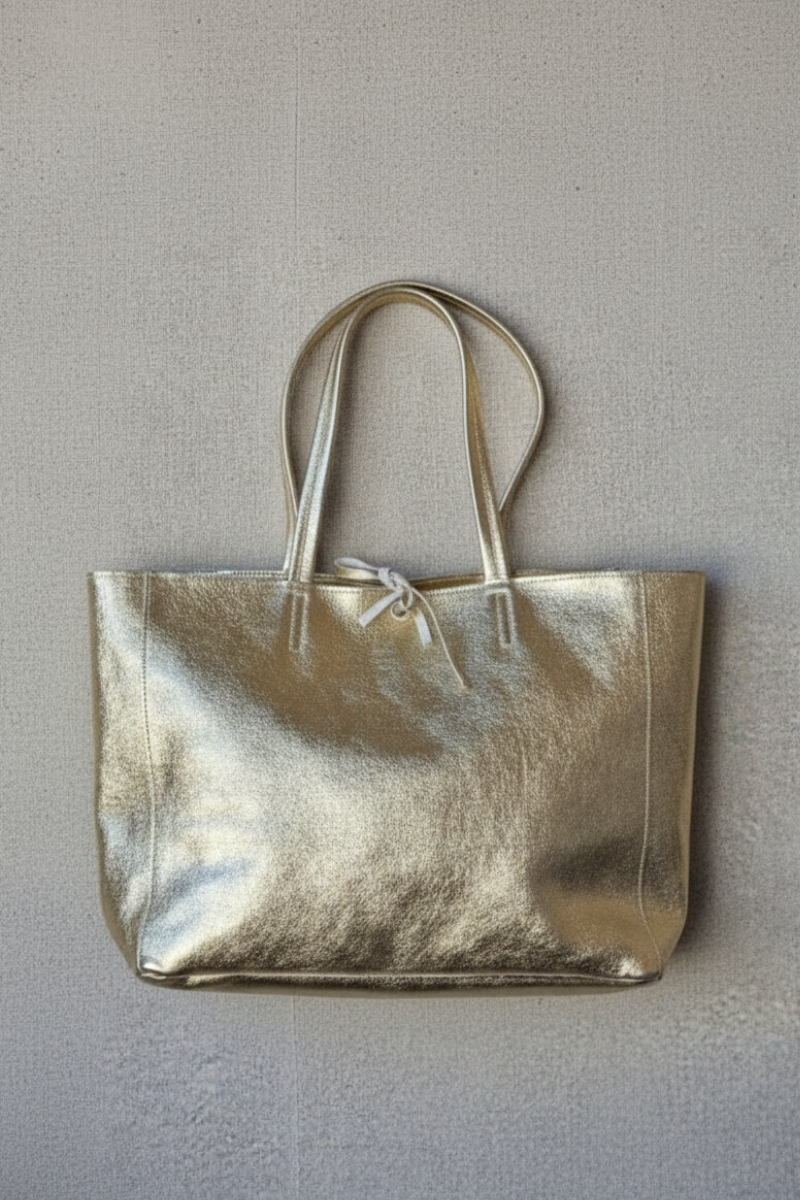 Bolso shopping con cremallera dorado