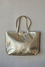 Bolso shopping con cremallera dorado