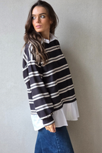 Jersey de rayas negras y blancas con detalle de camisa falsa