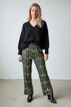 Pantalón de punto verde con lentejuelas