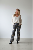 Pantalón de punto en gris con lentejuelas