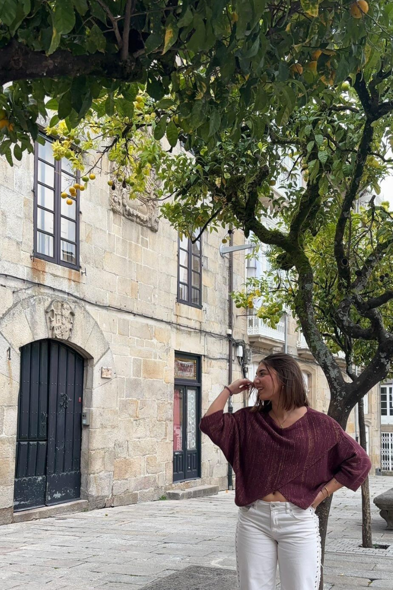 Jersey cruzado con brillo berenjena