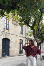 Jersey cruzado con brillo berenjena