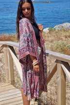 Kimono largo estampado rematado con espejitos tonos rosa