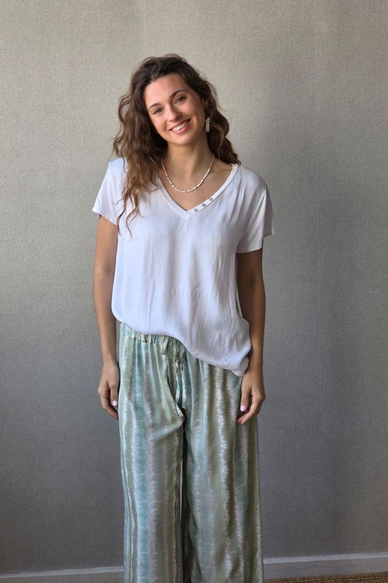 Blusa de seda con tres botones blanca