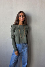 Camisa manga larga con tachas