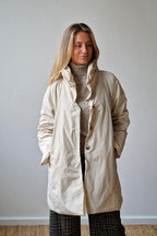 Parka larga tipo chubasquero beige