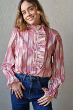 Blusa estampado de rayas y volante rosa
