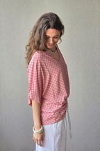 Blusón oversize estampado de flores rosa
